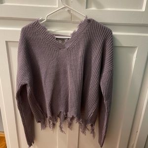 Lavender destroyed sweater. Super cute with frayed material at bottom